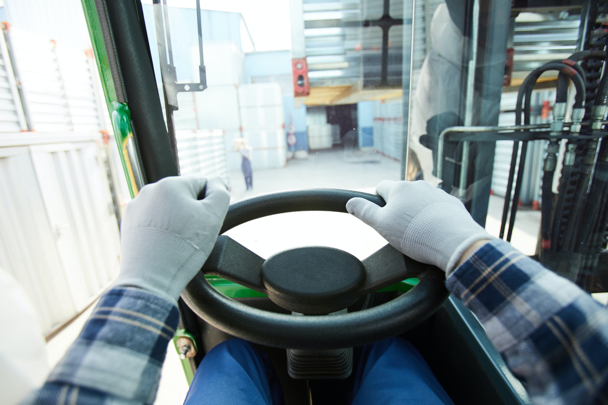 Truck driver at steering wheel
